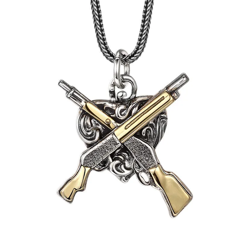 925 sterling silver pendant with dual gun heart-shaped design, 34 by 31 millimetres, silver colour
