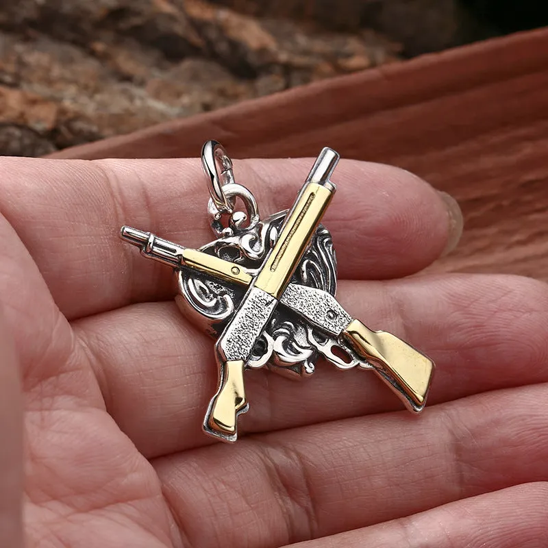 925 sterling silver pendant with dual gun heart-shaped design, 34 by 31 millimetres, silver colour