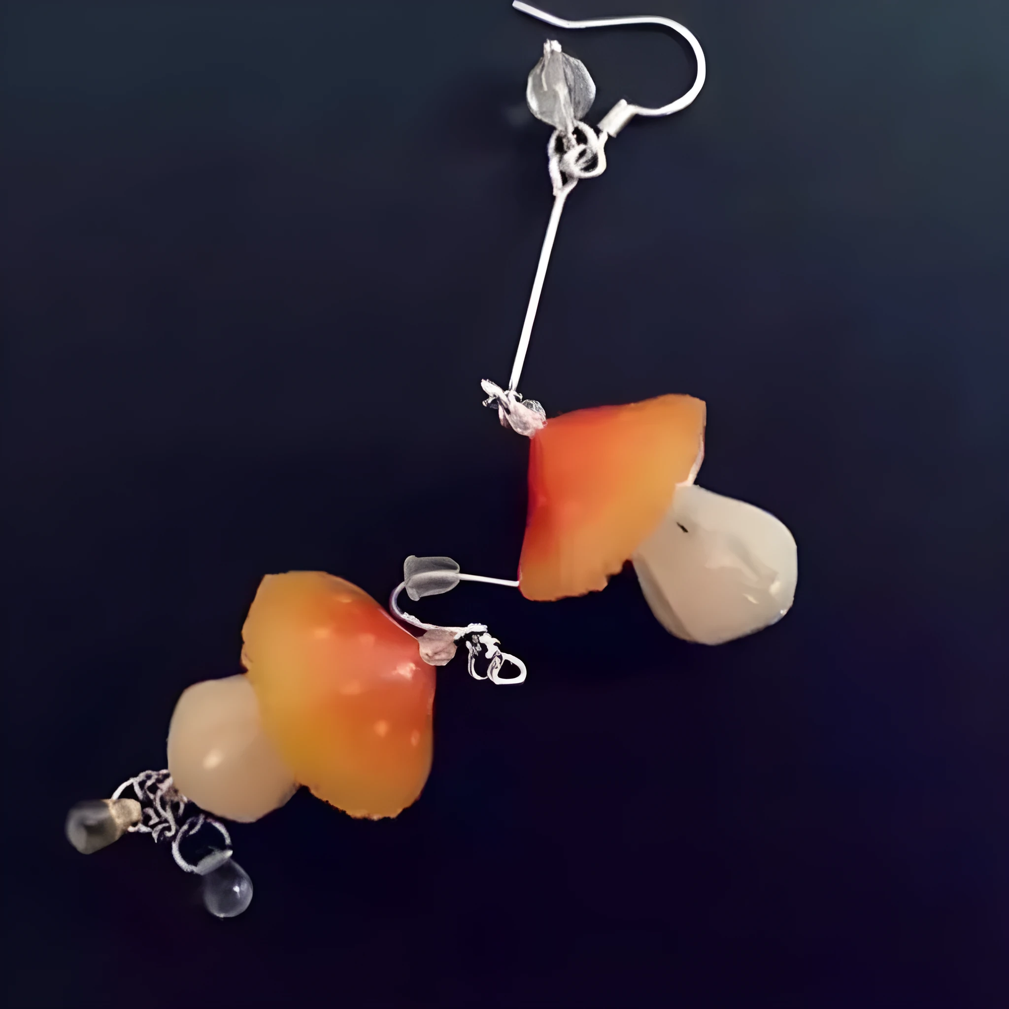 Resin heat shrinkable small mushroom earrings in yellow original style on plain background