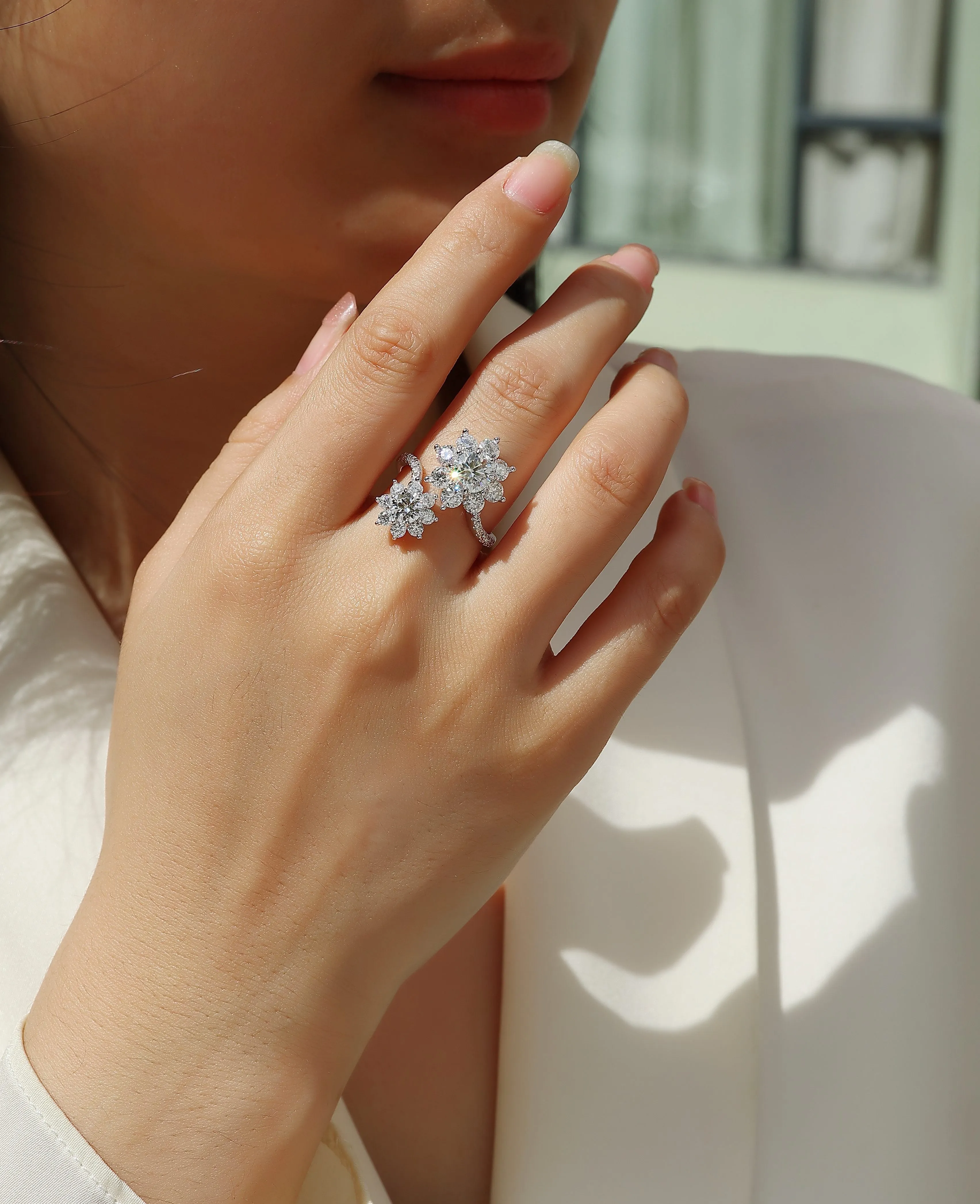 1 carat moissanite wedding ring set in S925 silver with platinum plating on a white background with gift box