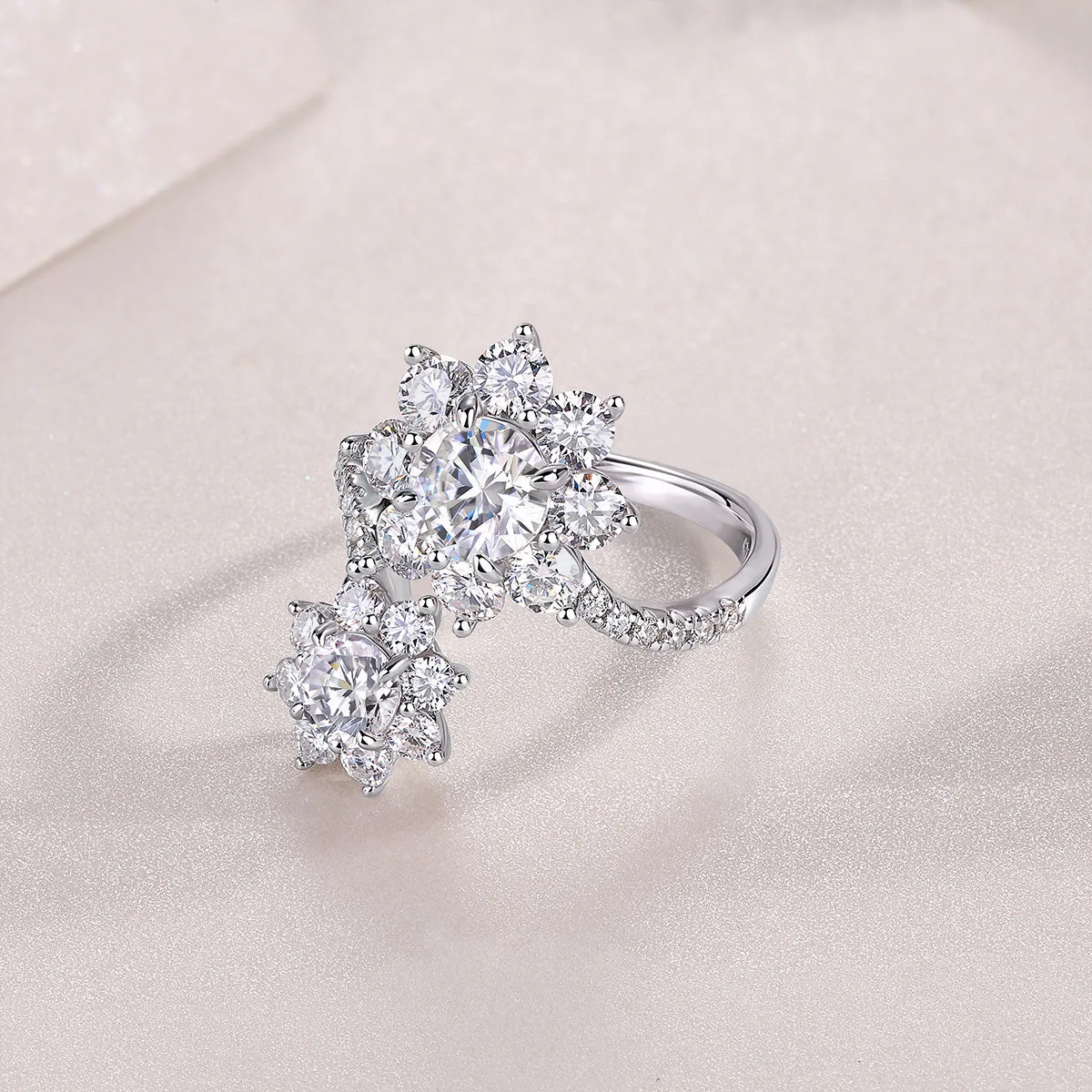 1 carat moissanite wedding ring set in S925 silver with platinum plating on a white background with gift box