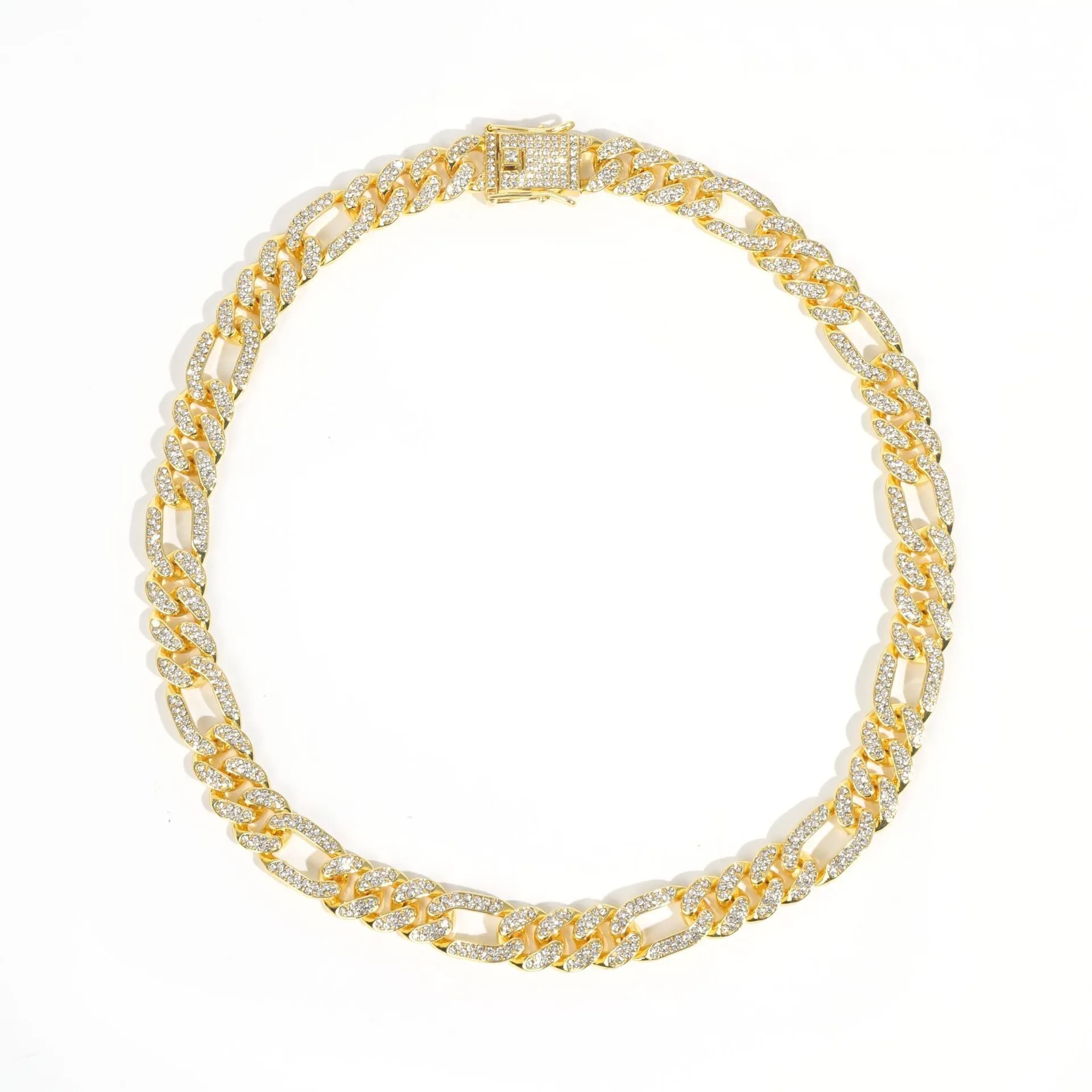 Rap style figaro chain necklace with geometric rhinestone pendant in silver colour on a plain background