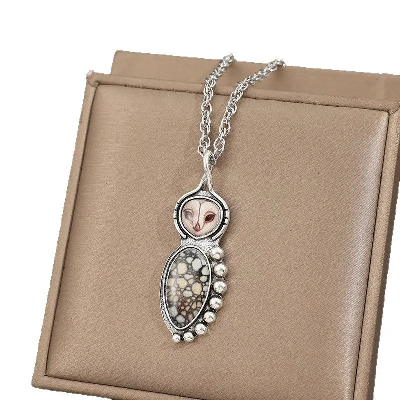 Vintage owl pendant necklace with turquoise alloy finish on zinc alloy cross chain