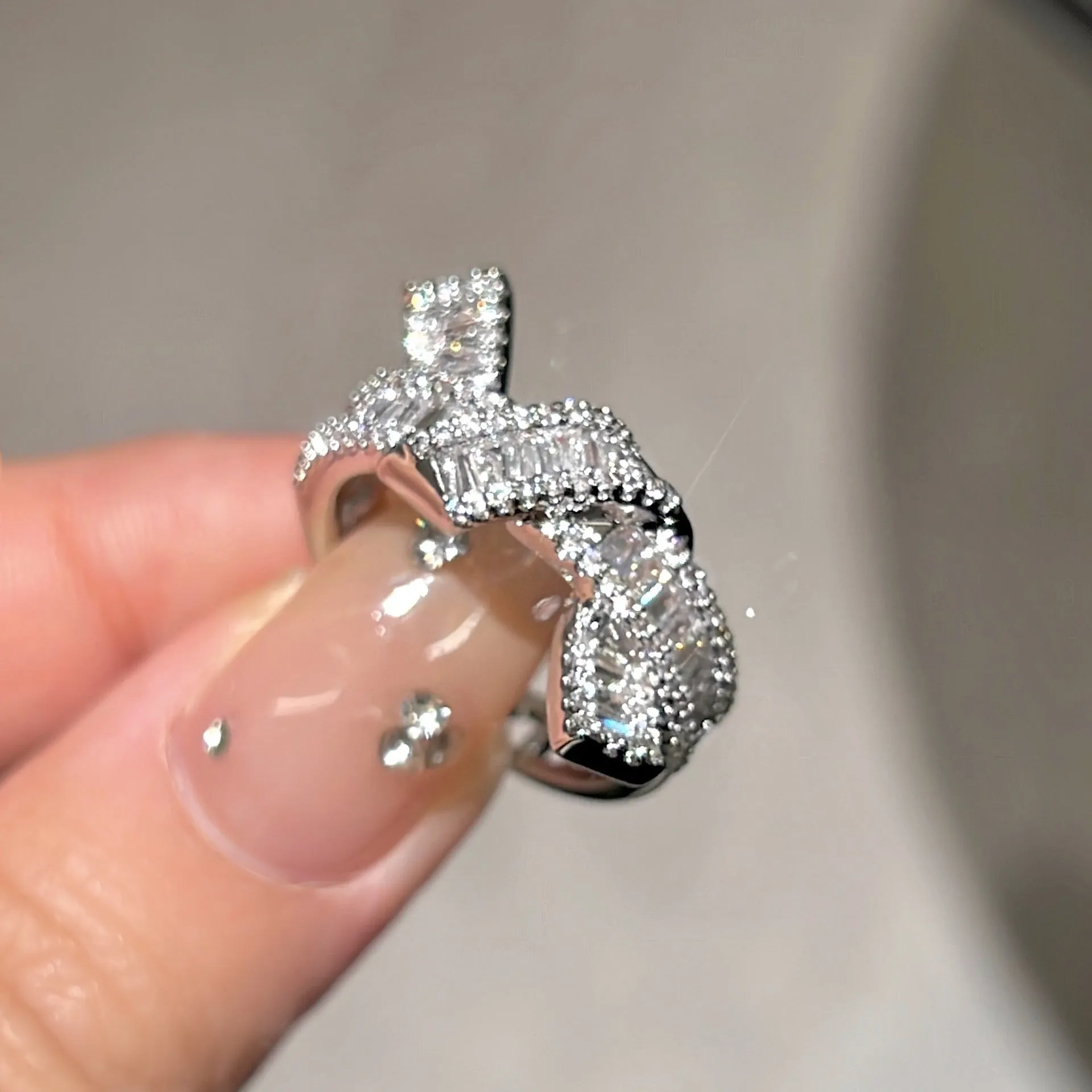 Silver cross open ring with bow shape, copper base, electroplated finish, light luxury style