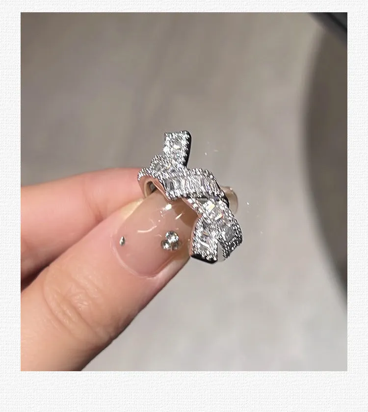 Silver cross open ring with bow shape, copper base, electroplated finish, light luxury style