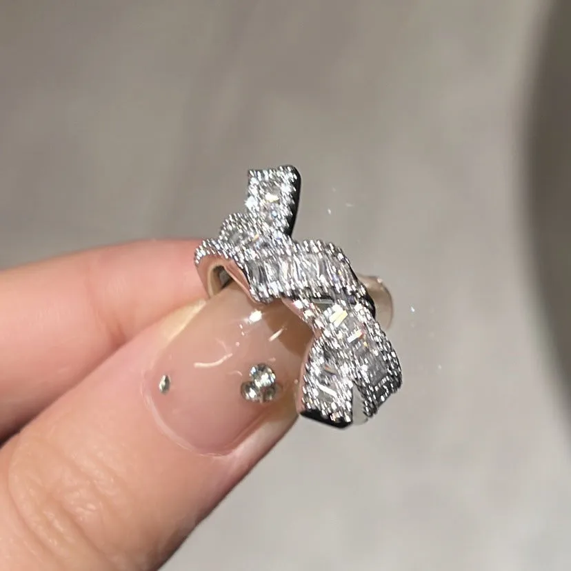 Silver cross open ring with bow shape, copper base, electroplated finish, light luxury style