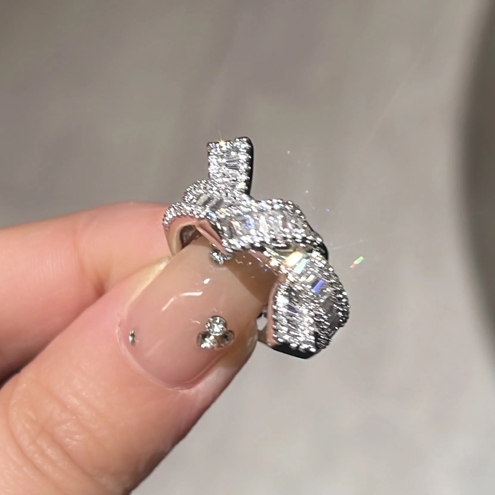 Silver cross open ring with bow shape, copper base, electroplated finish, light luxury style