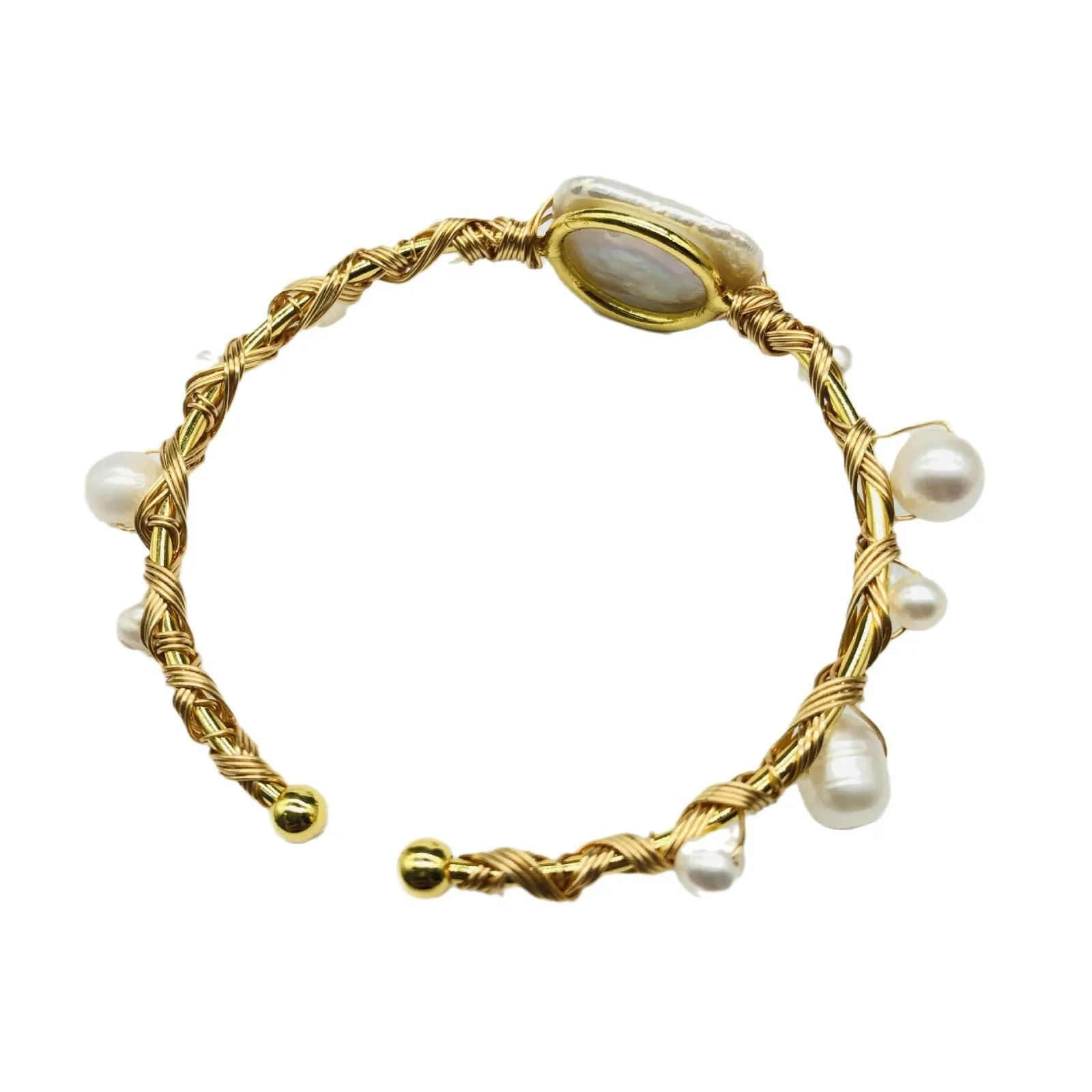 Natural freshwater pearl bracelet with gold titanium steel wire-wrap on hand model