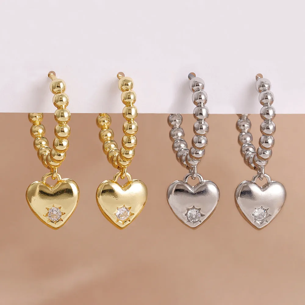 Pair of vintage gold heart earrings for women in cold wind style, copper construction, gold white colour