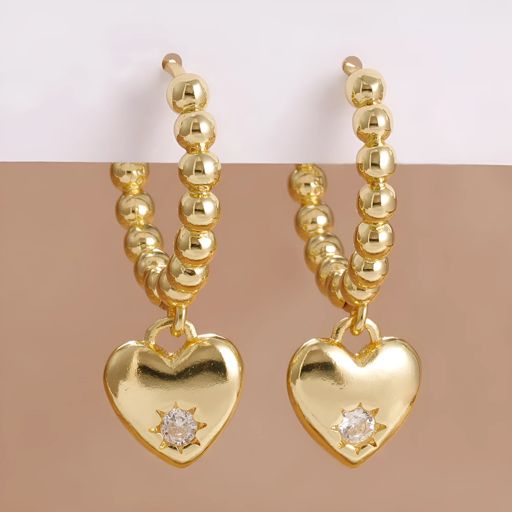 Pair of vintage gold heart earrings for women in cold wind style, copper construction, gold white colour