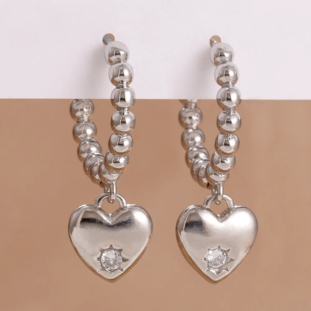 Pair of vintage gold heart earrings for women in cold wind style, copper construction, gold white colour