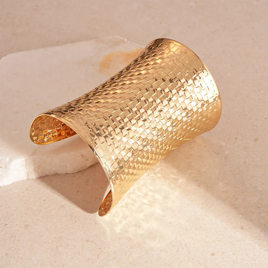 Women's vintage exaggerated personalised bracelet with round gold charm measuring 6.5 by 9.7 centimetres