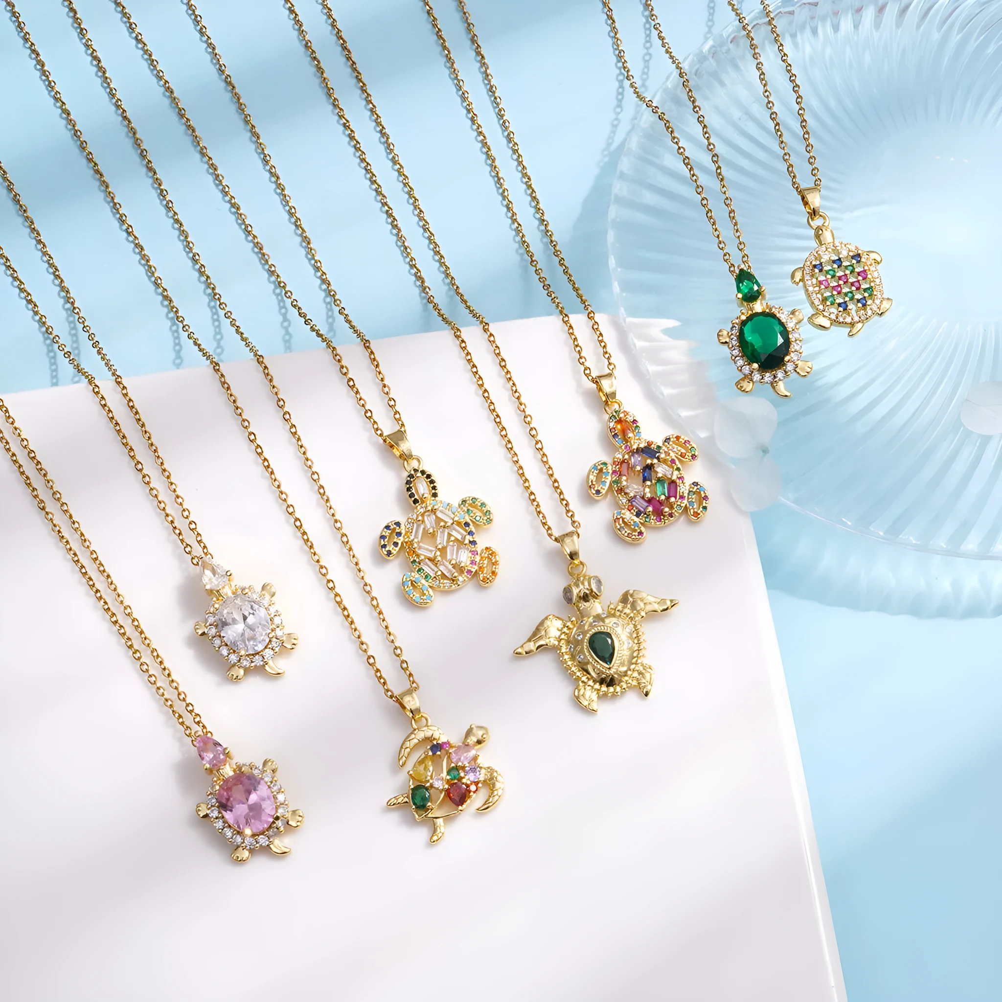 Gold-plated copper sea turtle necklace with zirconium accents and mixed gemstone inlay, O-link chain, light luxury style for women