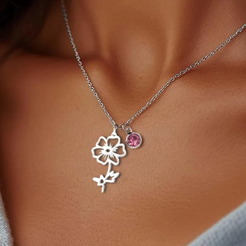 Stainless steel flower pendant necklace with rose-inspired design and adjustable O-link chain