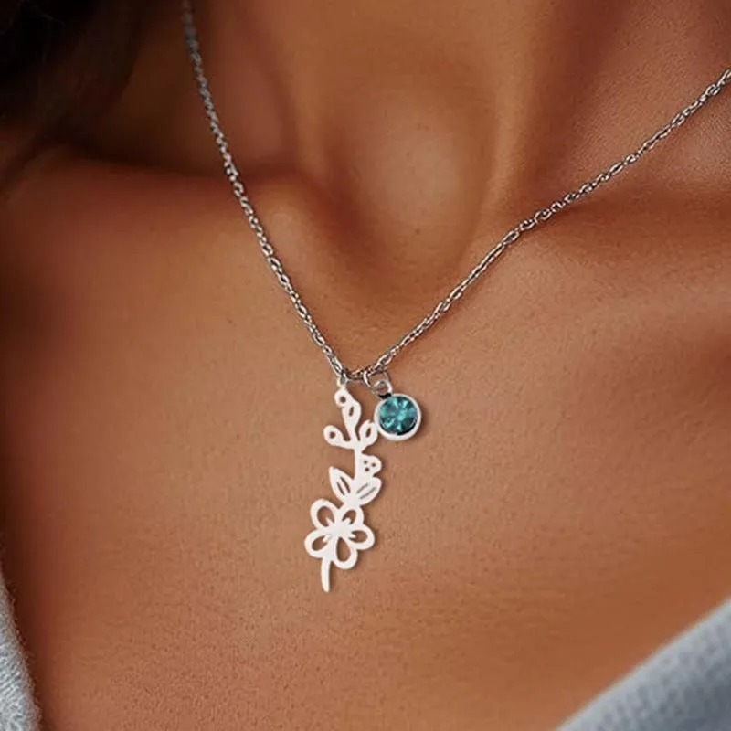 Stainless steel flower pendant necklace with rose-inspired design and adjustable O-link chain