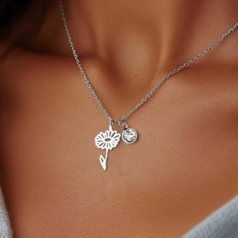 Stainless steel flower pendant necklace with rose-inspired design and adjustable O-link chain