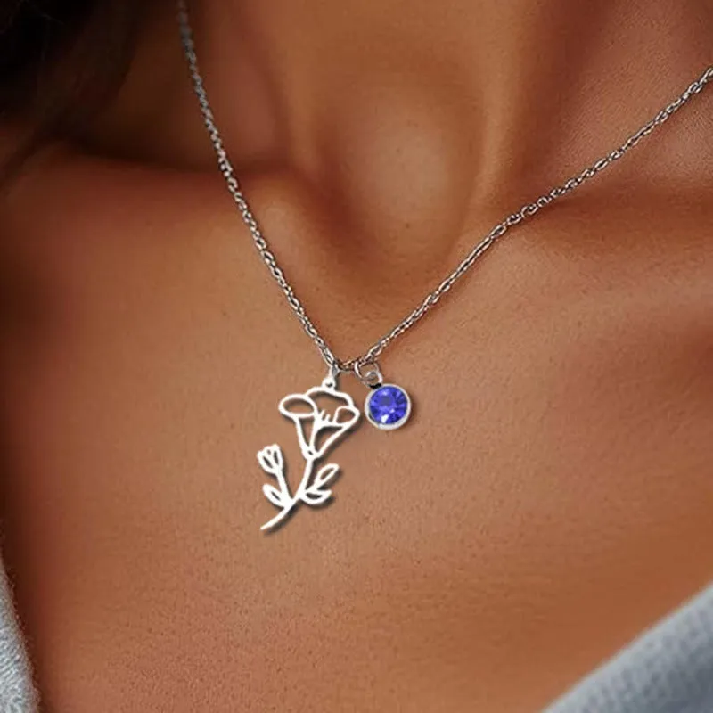 Stainless steel flower pendant necklace with rose-inspired design and adjustable O-link chain