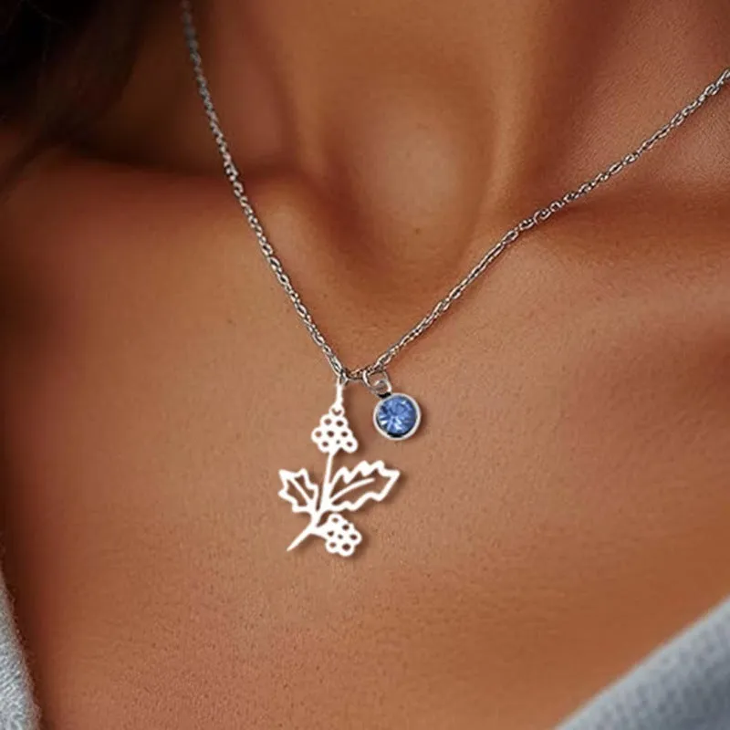 Stainless steel flower pendant necklace with rose-inspired design and adjustable O-link chain