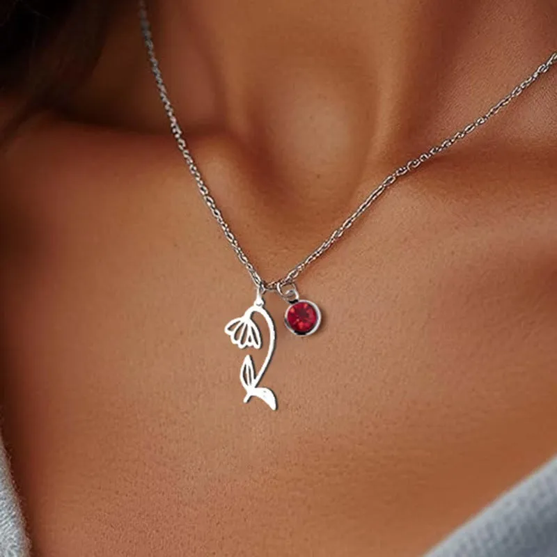 Stainless steel flower pendant necklace with rose-inspired design and adjustable O-link chain