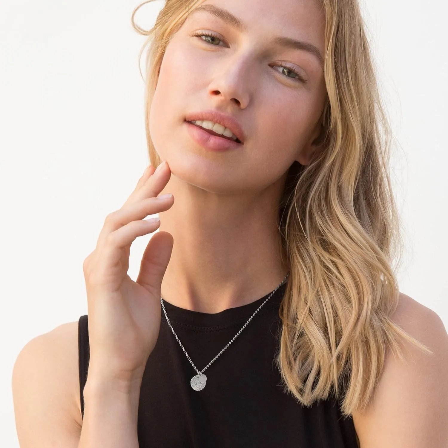 Round coin pendant necklace in gold finish on white background, adjustable 41-50cm stainless steel side chain