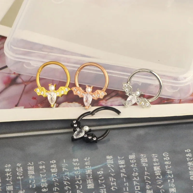 Closed-loop bat nose ring in stainless steel electroplated silver finish with star shape and moon elements