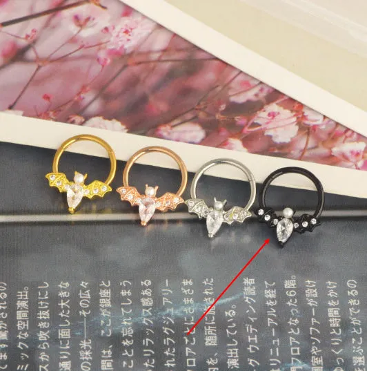Closed-loop bat nose ring in stainless steel electroplated silver finish with star shape and moon elements
