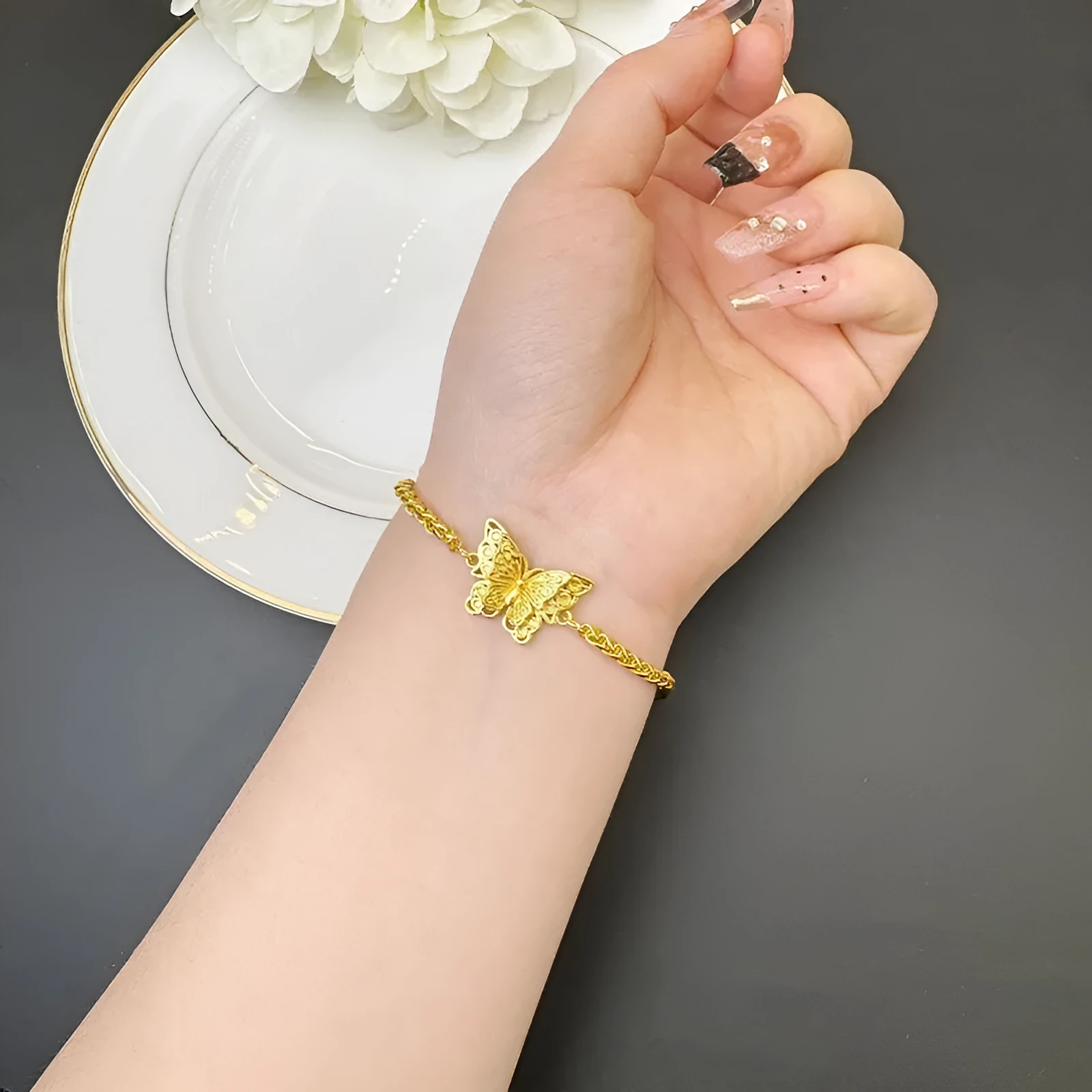 Gold-plated copper hollow butterfly bracelet with electroplated finish, retro style, gold colour