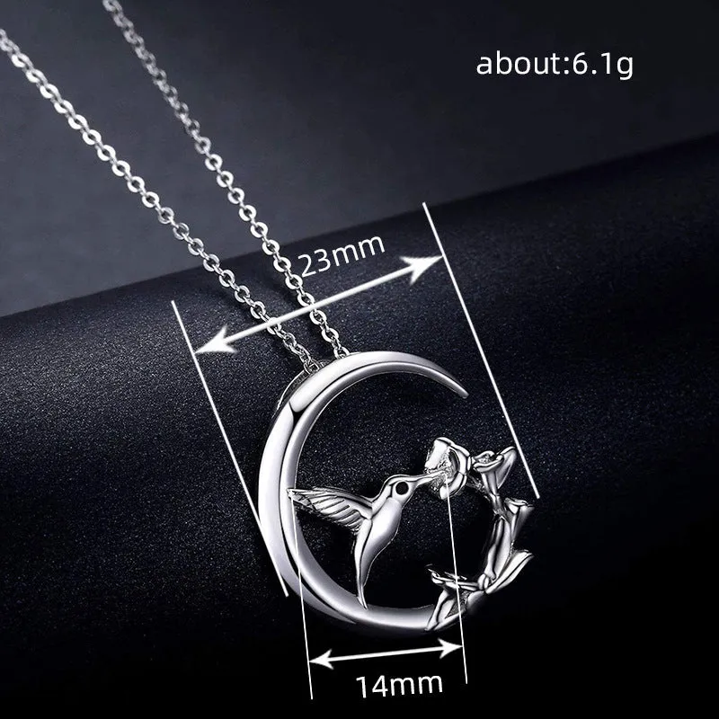 Copper O-link chain necklace for women with morning glory blossom and hummingbird pendant in platinum white gold colour