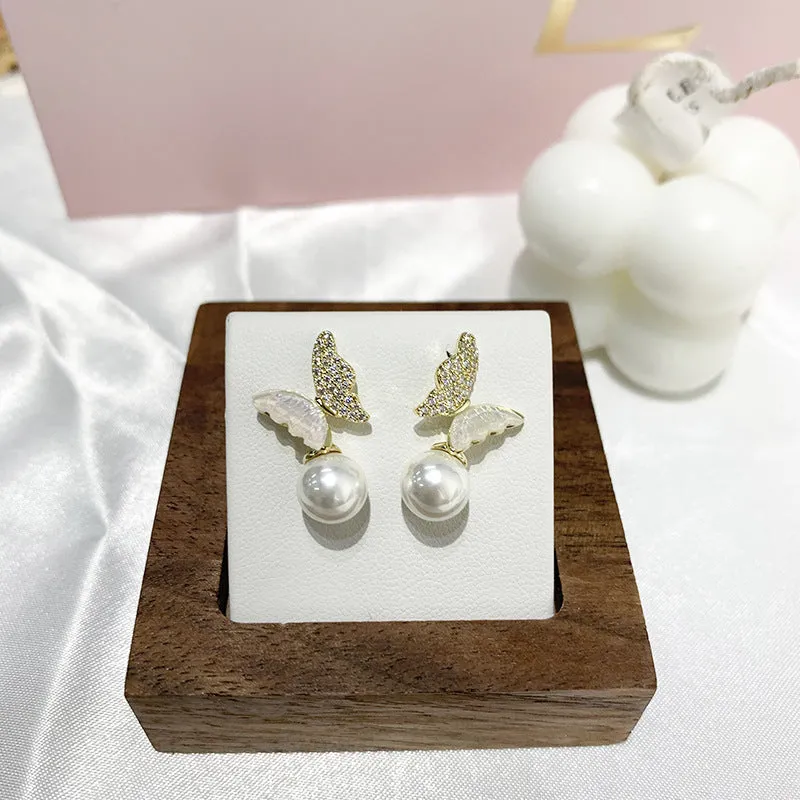 Pearl Zircon Bow Temperament Light Luxury Niche Earrings in pink colour, dangle style