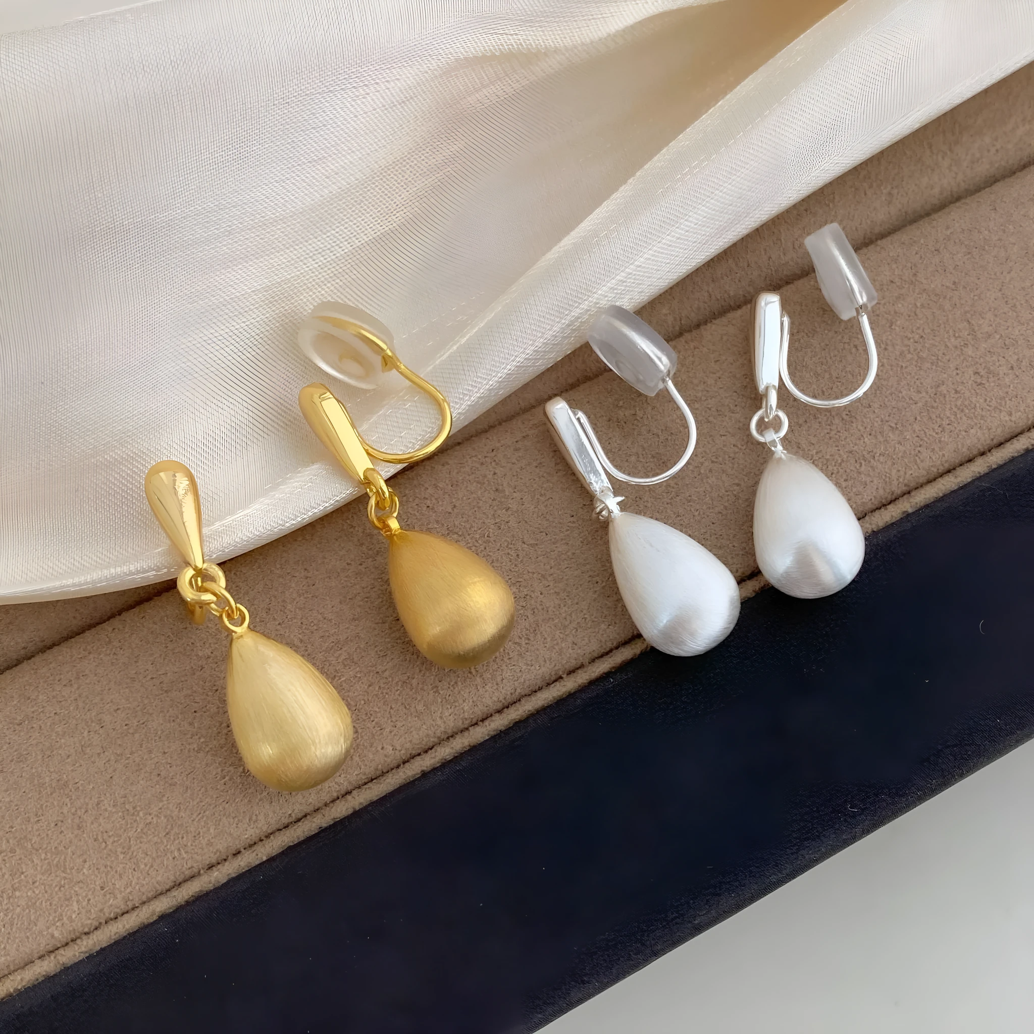 Copper teardrop drop pendant earrings in gold electroplated finish, pair of ear clips