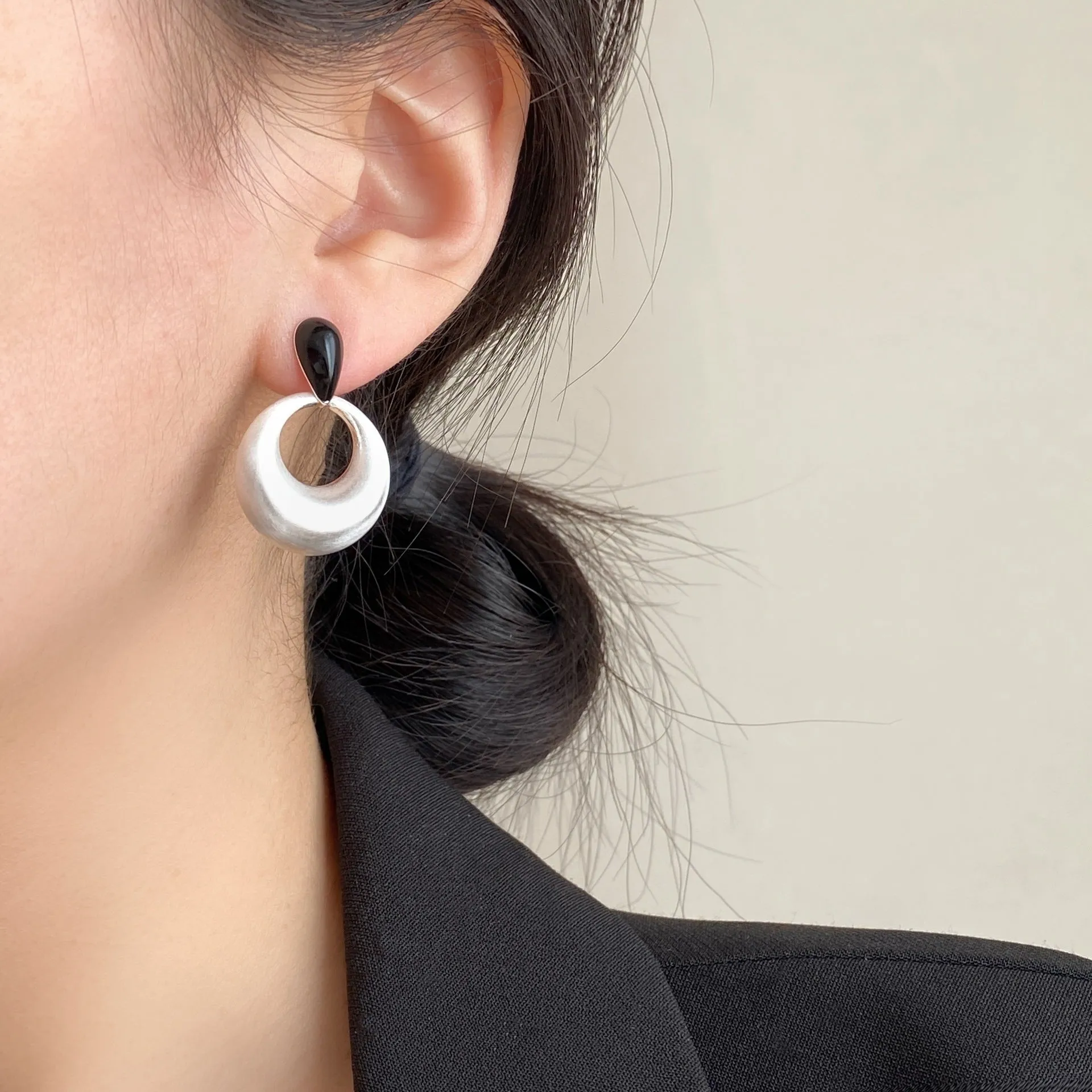 Pair of retro geometric drop earrings with enamel colour clash and oil drop finish on copper base