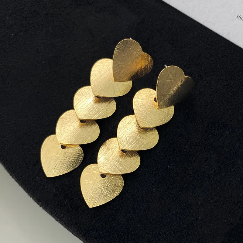Gold geometric heart tassel ear clip without piercing, copper electroplated