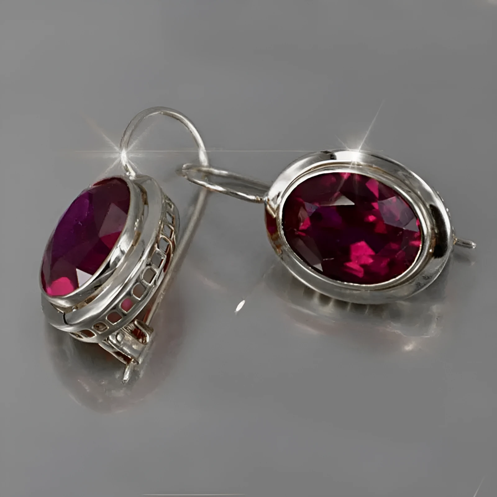 Minimalist hollow oval gemstone earrings in silver colour with geometric design and alloy construction