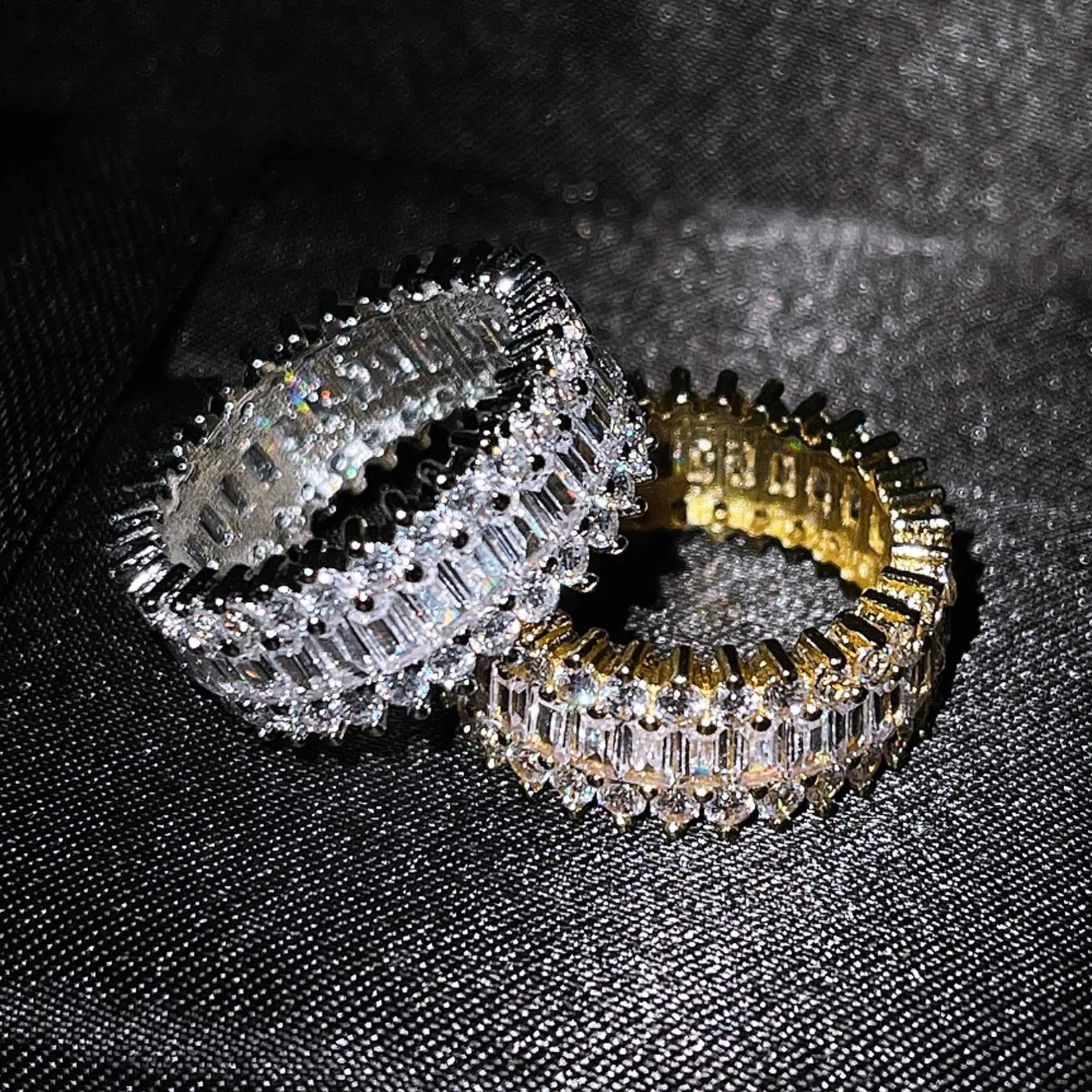 Geometric copper ring with zircon inlay in rose gold finish on neutral background