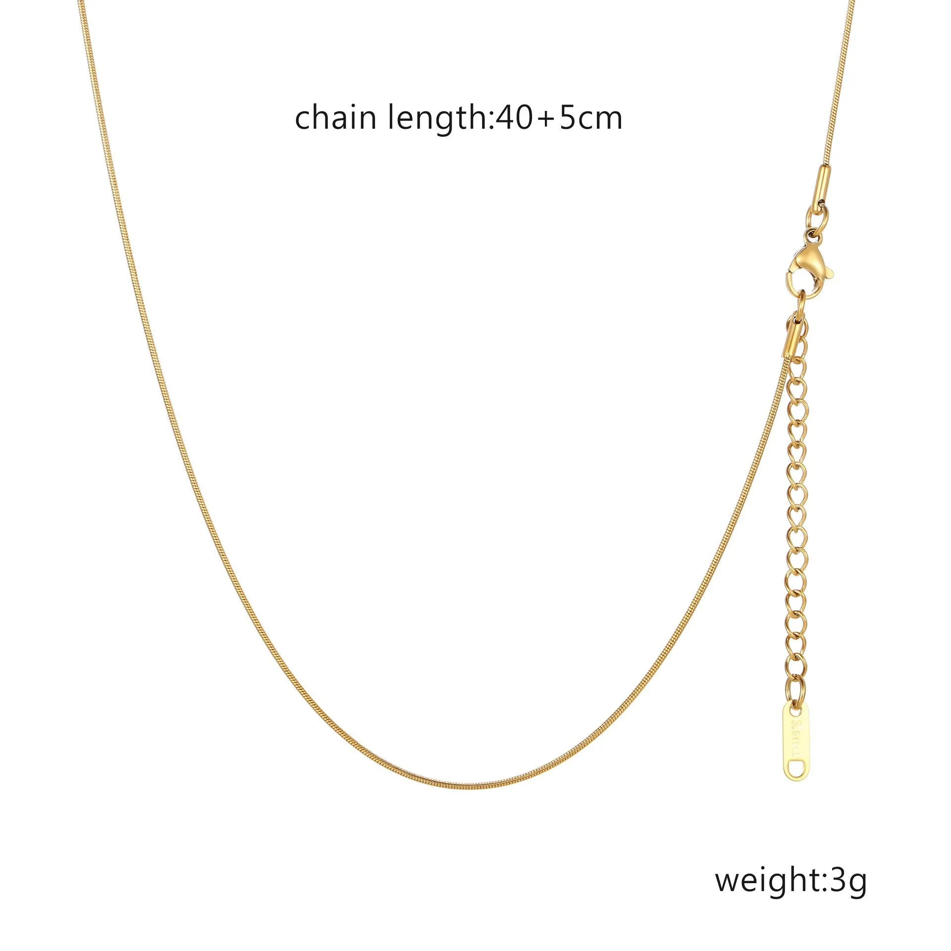 Women's stainless steel necklace with 18K gold hollow round pendant and O-link chain on neutral background