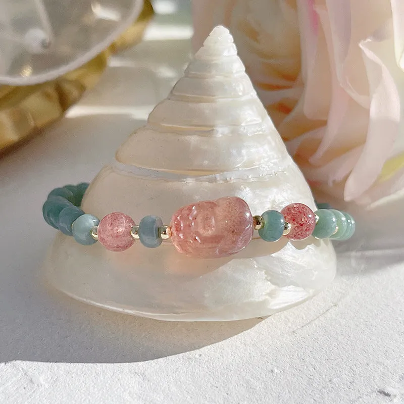 Natural blue water jade bracelet with gourd charm and peace buckle on woman's wrist
