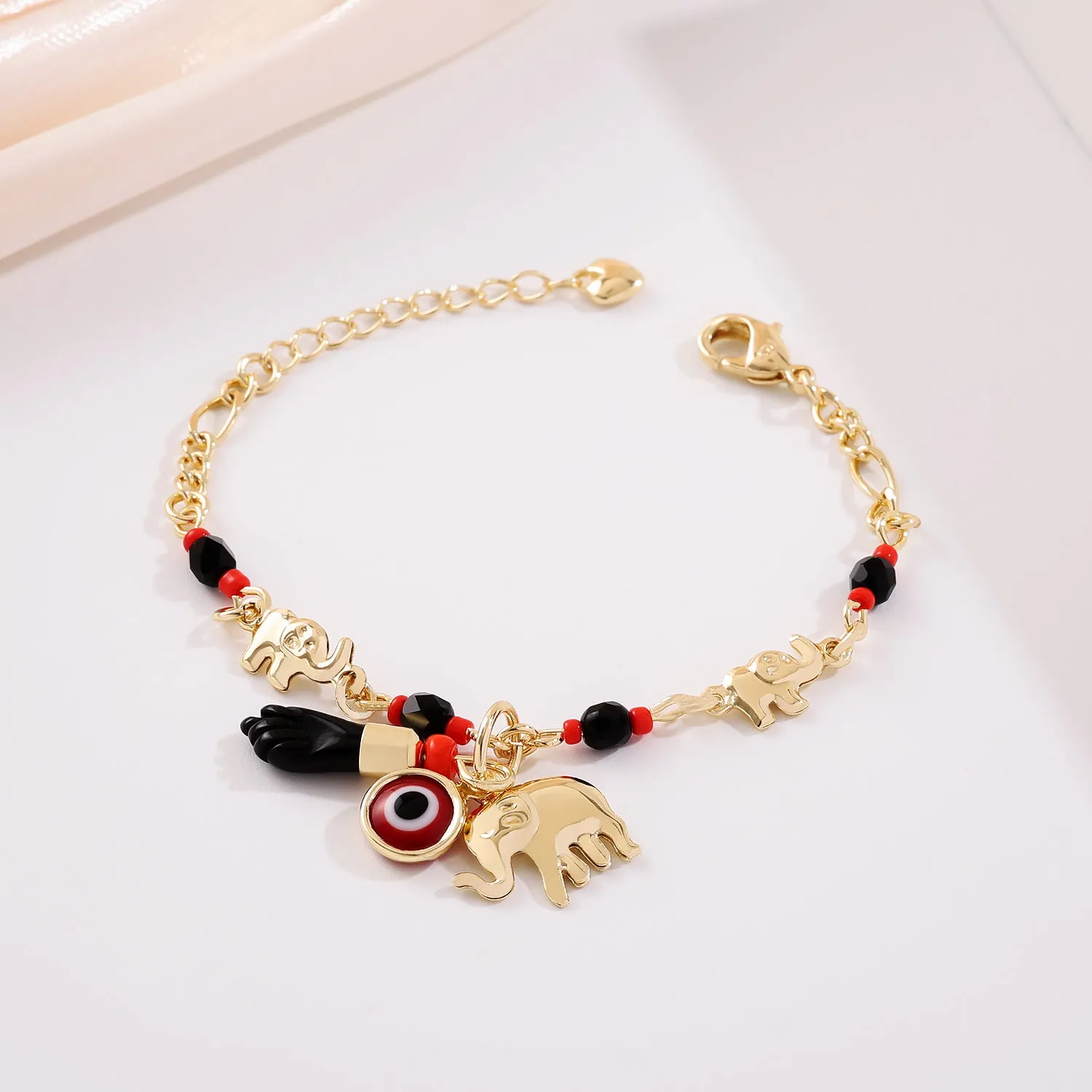 Cartoon elephant bracelet in gold colour, copper with electroplated finish, geometric shape