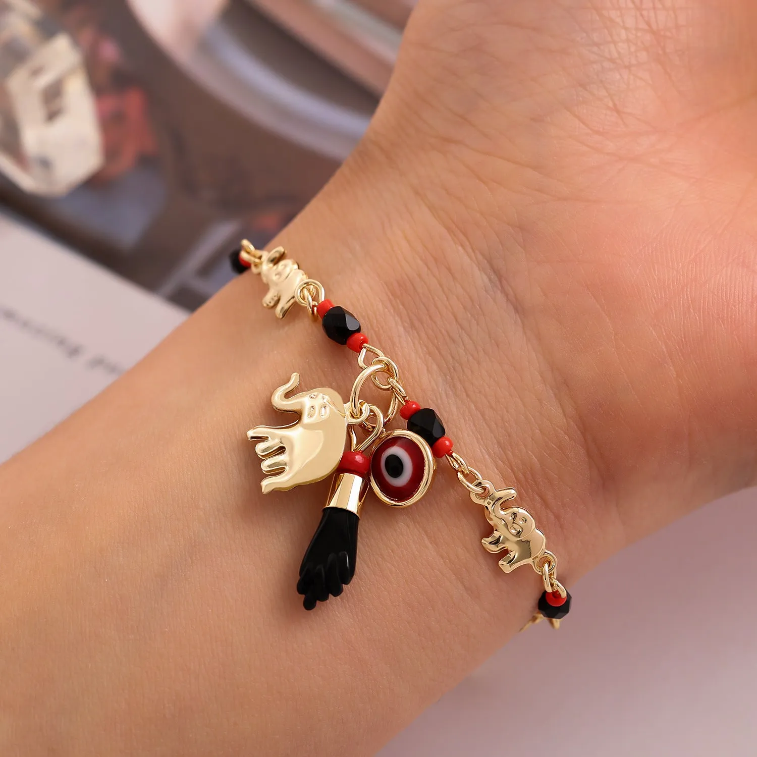 Cartoon elephant bracelet in gold colour, copper with electroplated finish, geometric shape