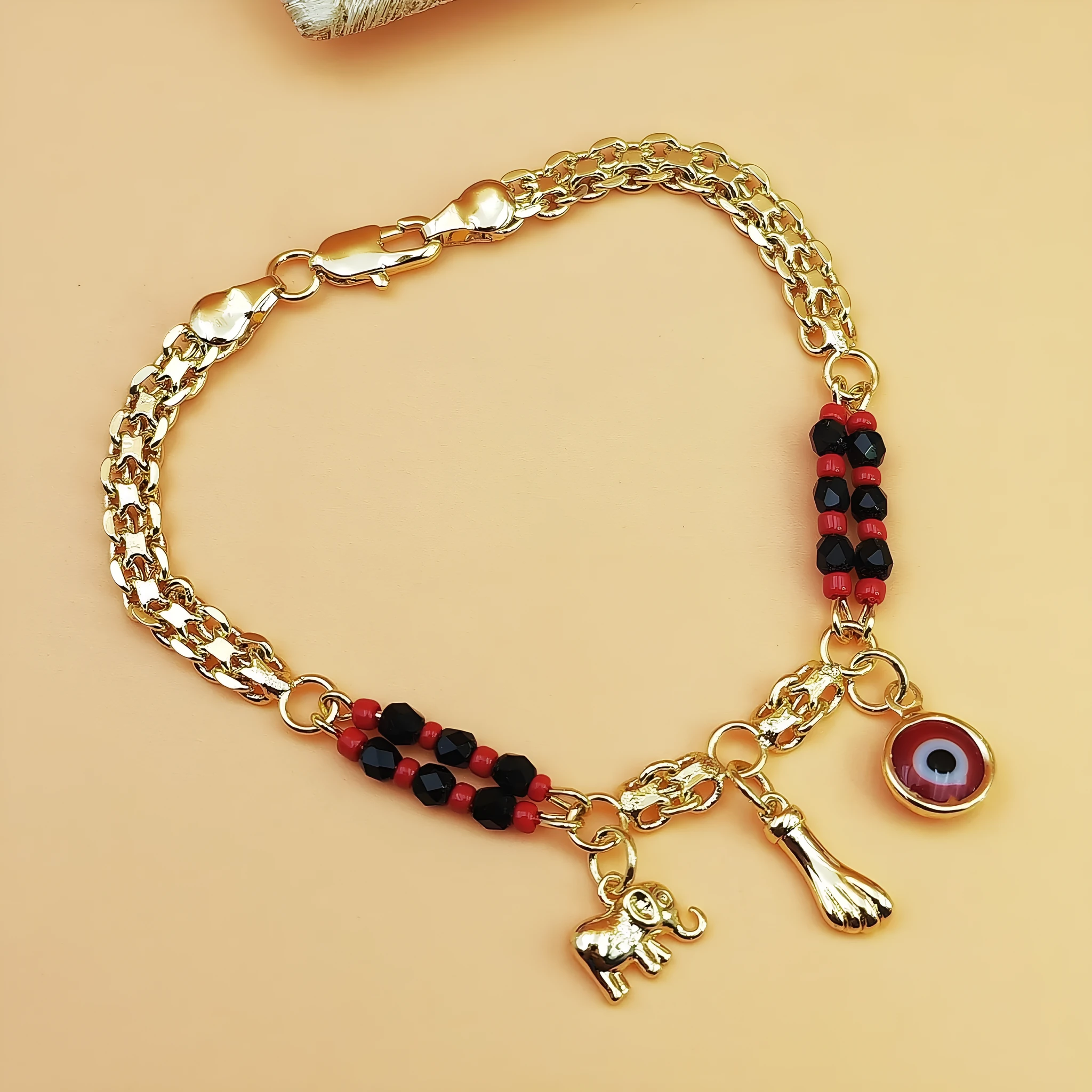 Cartoon elephant bracelet in gold colour, copper with electroplated finish, geometric shape