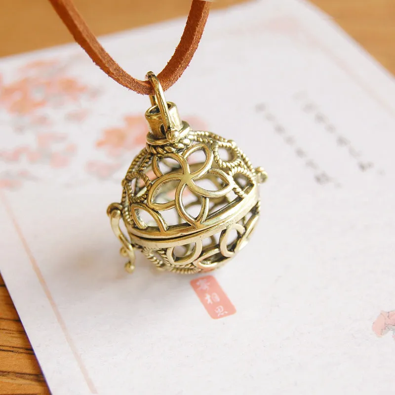 Retro hollowed-out sachet ball pendant necklace in ancient bronze alloy with 70cm chain and heart shape