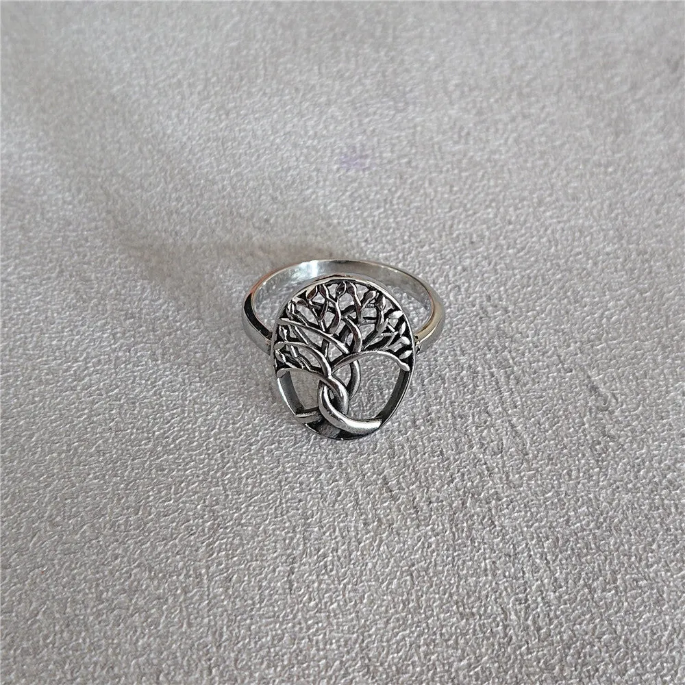 Retro Tree of Life design on a men's titanium steel ring shown in picture colour
