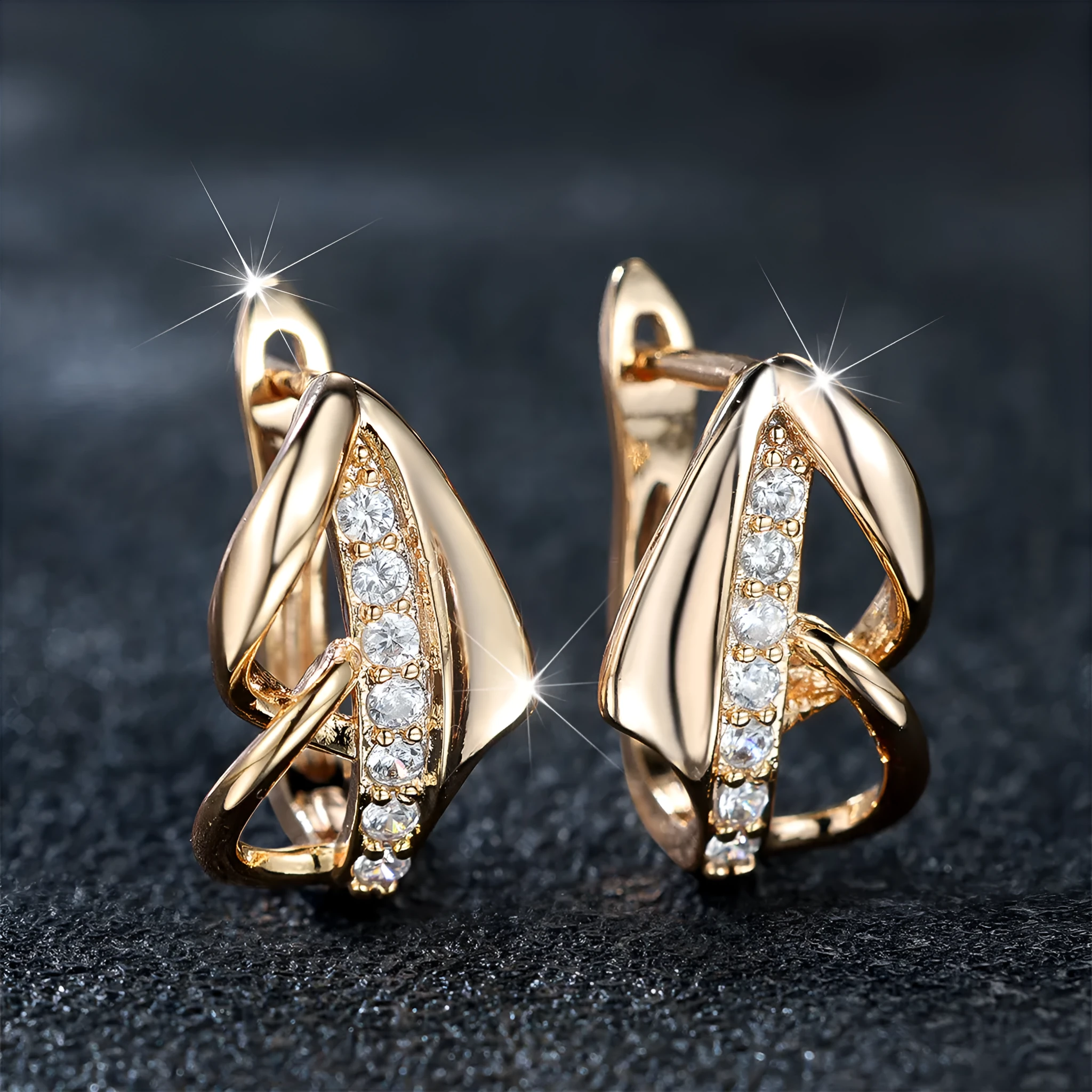 Copper geometric arrow ear clip in champagne gold with white diamond accent