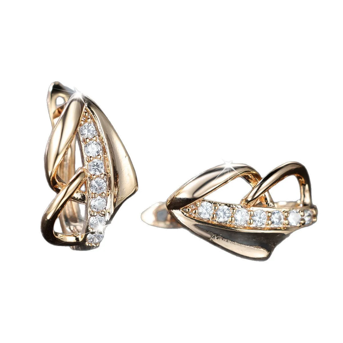 Copper geometric arrow ear clip in champagne gold with white diamond accent