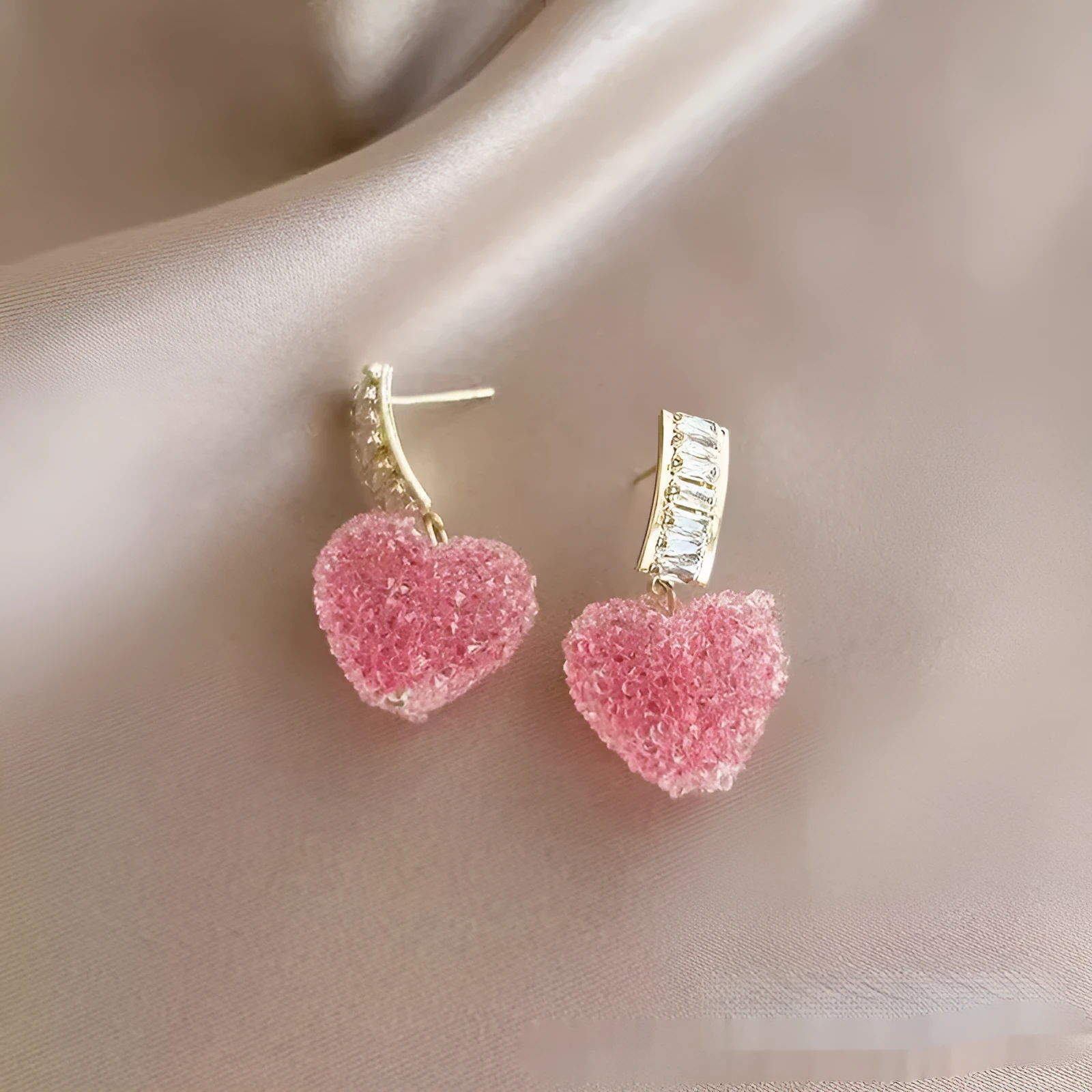 Peach heart-shaped stud earrings with candy gemstone accents in pink and blue colour variations