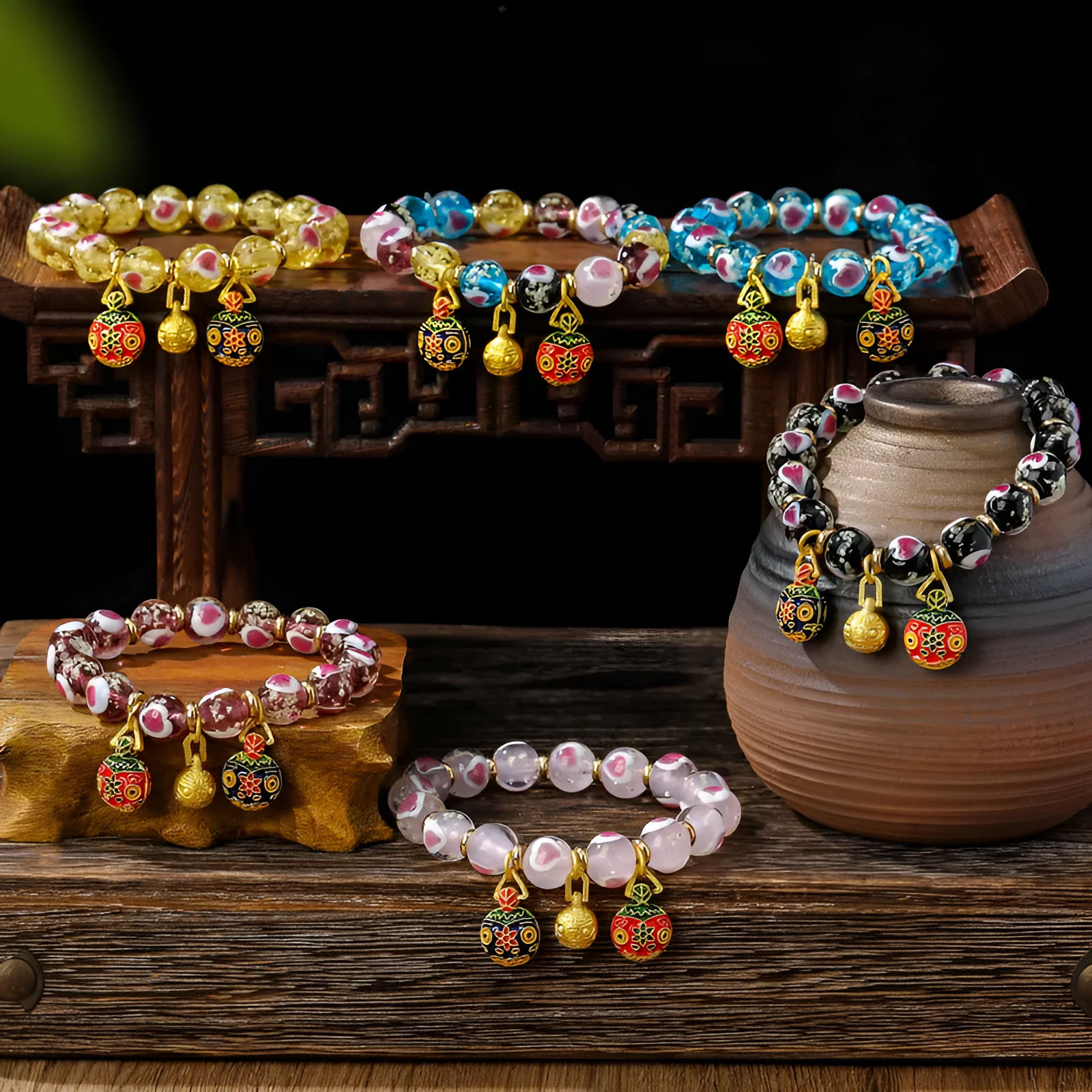 Handmade heart-shaped glass bead bracelet with ancient fluorescent glaze and swallowing gold beast design