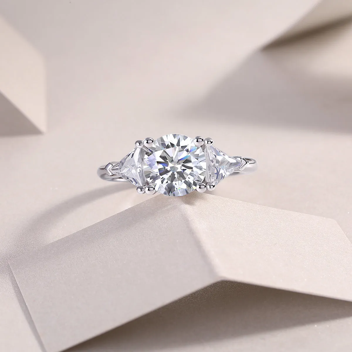 Ocean Diamond 2-carat moissanite wedding ring set in gold-plated S925 silver on a white background