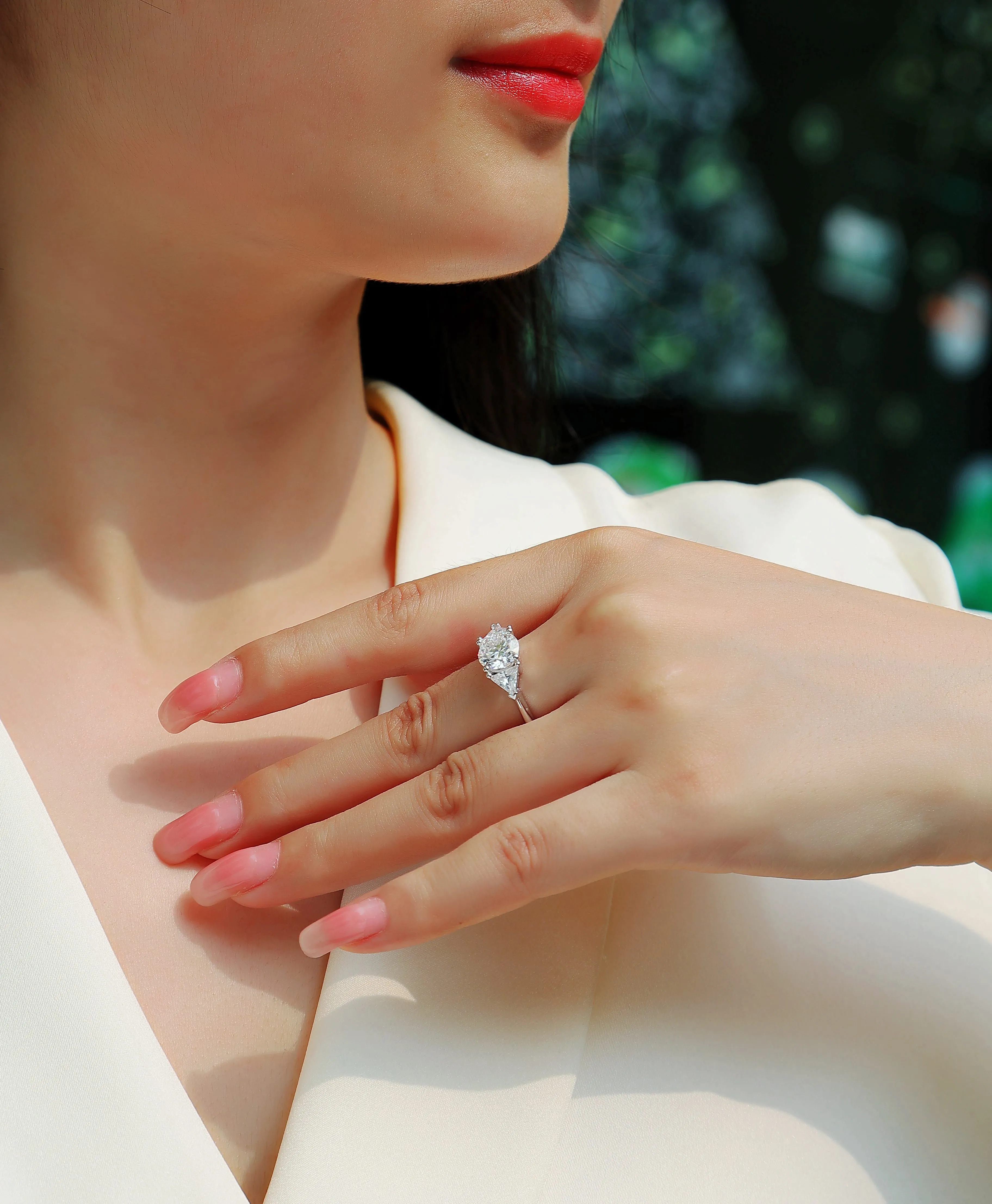 Ocean Diamond 2-carat moissanite wedding ring set in gold-plated S925 silver on a white background