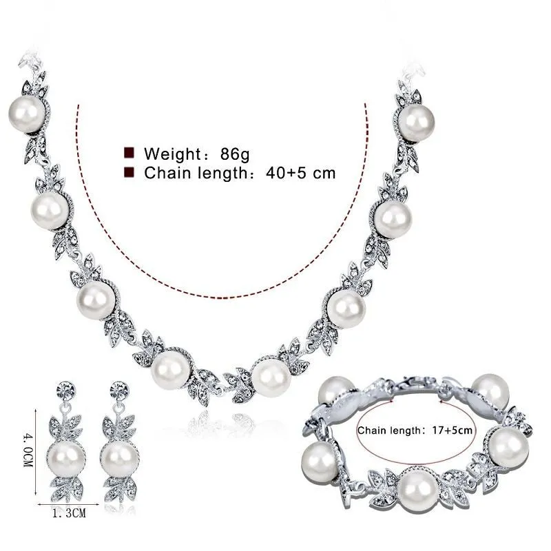 Three-piece jewellery set with rhinestone and pearl necklace, earrings, and bracelet in silver finish