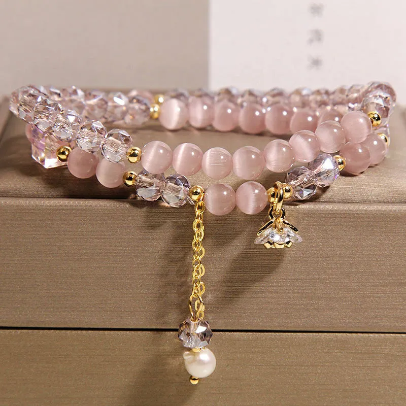 New Chinese style gold-plated double ring bracelet with pink cat eye crystal and zircon small flower detail