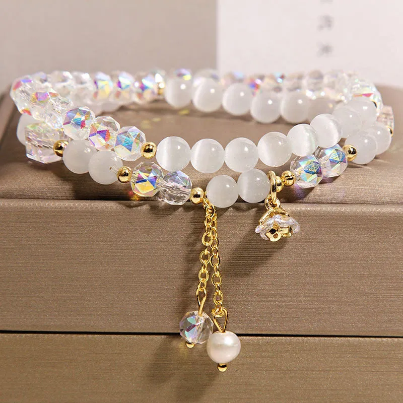 New Chinese style gold-plated double ring bracelet with pink cat eye crystal and zircon small flower detail